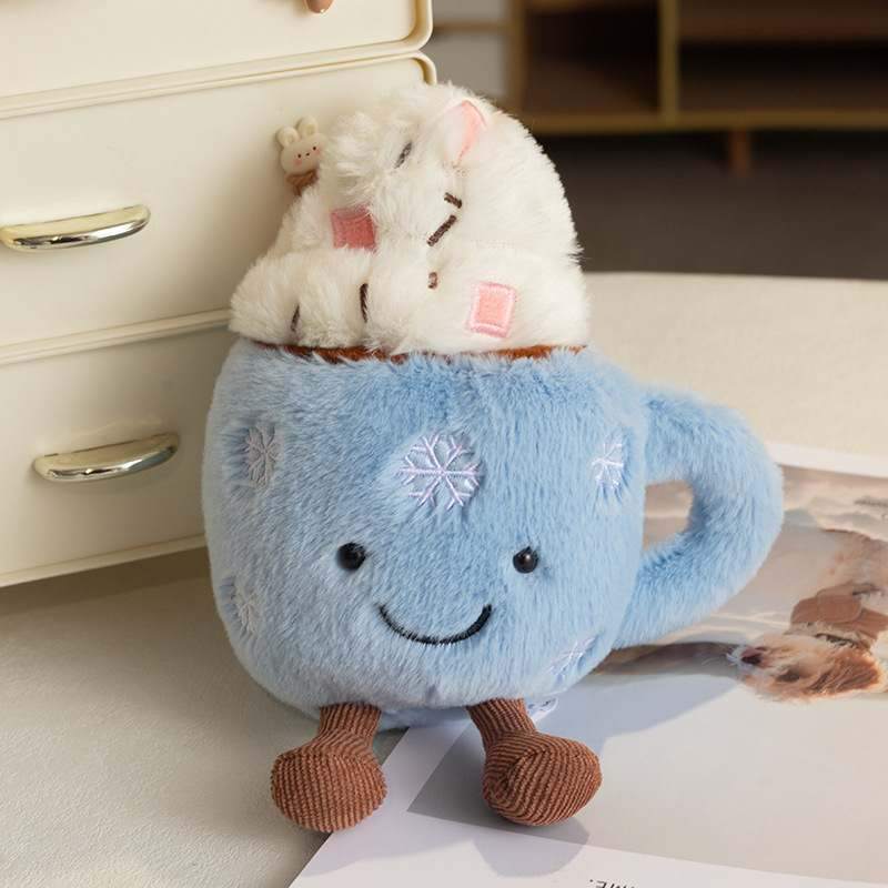 Kawaii blue hot cocoa mug plush toy with whipped cream and dangling legs for boutique wholesale.