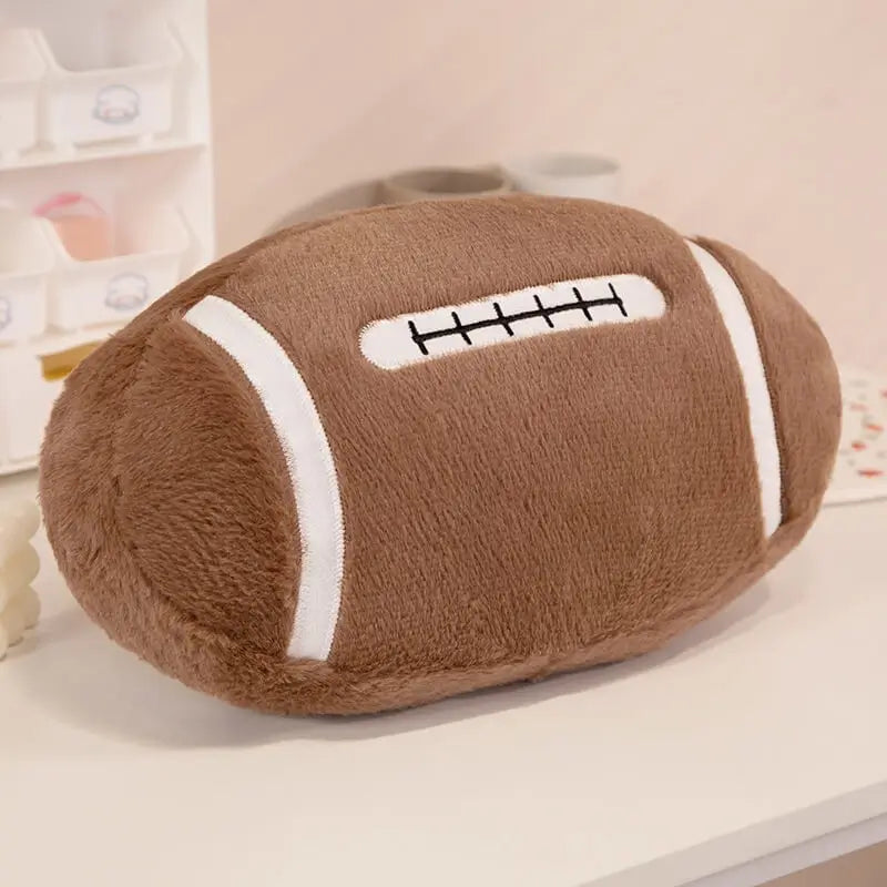 Brown American football rugby plush toy with white stitching for wholesale buyers.