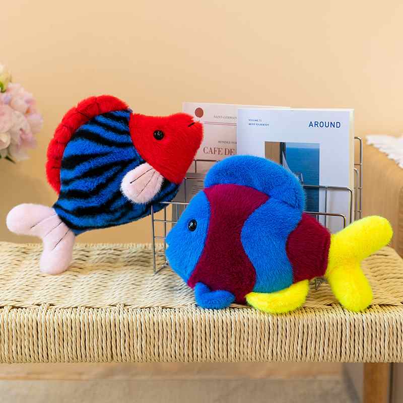 B2B ocean animal stuffed striped and blue fish toys on a wire rack for boutique suppliers.