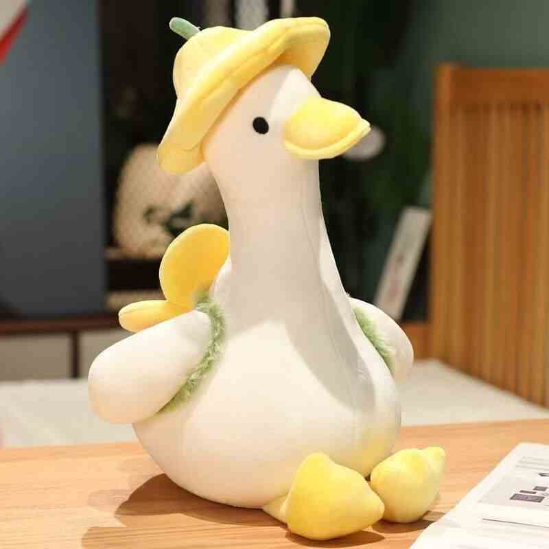Boutique floral goose stuffed toy with a lavender flower hat and green collar, tailored for seasonal gift wholesale distributors.