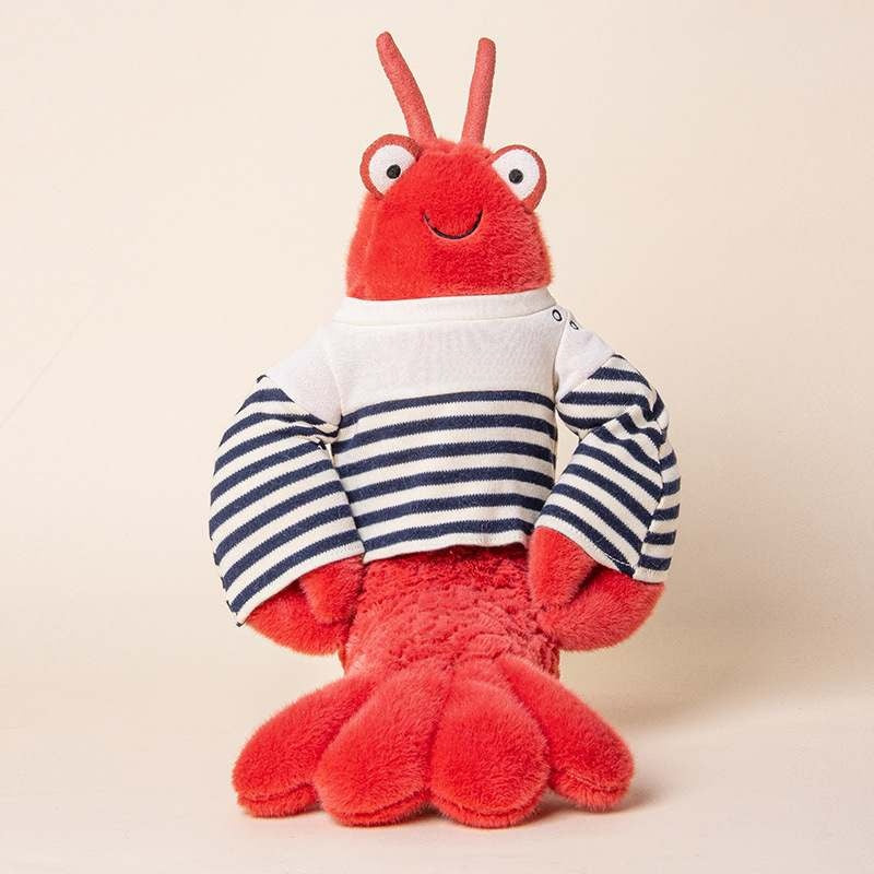 Boutique supply red lobster plushie wearing a striped knit shirt standing upright for toy distributors.