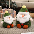 Boutique supply green Xmas Santa plush toys sitting on a carpet near a Christmas tree for wholesale