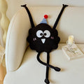 Bulk custom funny black monster cushion with long arms raised on a couch for B2B sourcing.