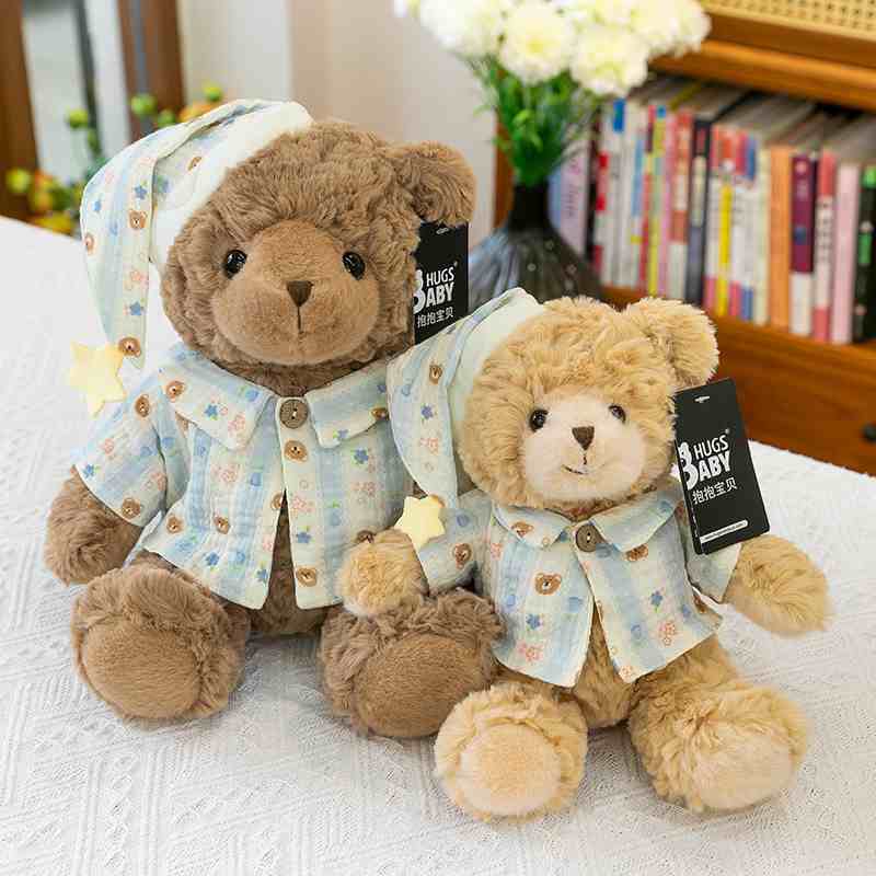 Bulk custom pajama bear stuffed animal vendor catalog showing light brown and dark brown teddy bears in sleepwear for boutique buyers.
