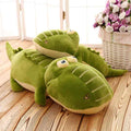 Bulk custom stuffed alligator pillow display on wooden floor for boutique retail vendors.