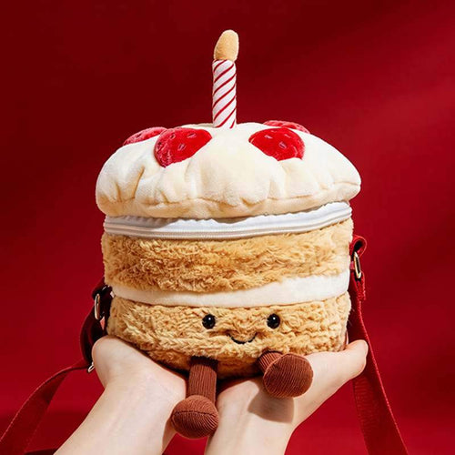 Premium plush birthday cake shoulder bag featuring a striped candle and strawberries for boutique suppliers.