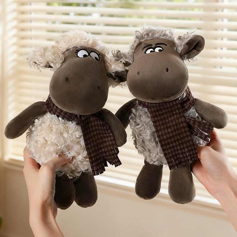 Two cute stuffed sheep plushies in beige and brown held by hands for bulk custom vendor orders.