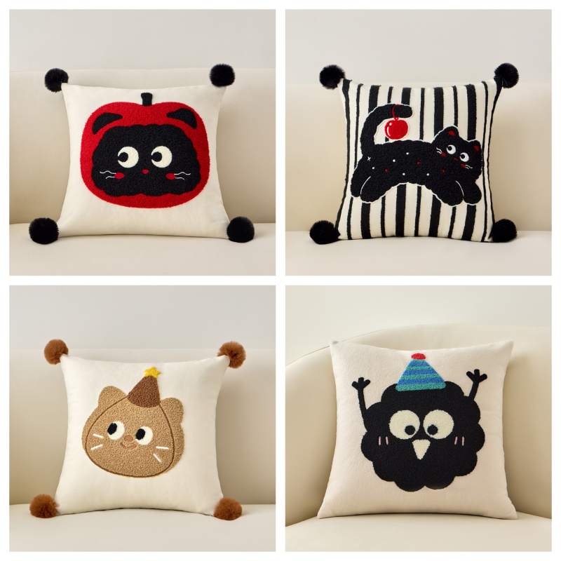 Bulk custom tufted cat pillow assortment including apple cat and party monster designs for vendor sourcing.