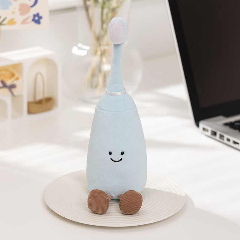 Bulk cute blue toothbrush stuffed animal with dangling legs, ideal for dental clinic promotional items and health education.