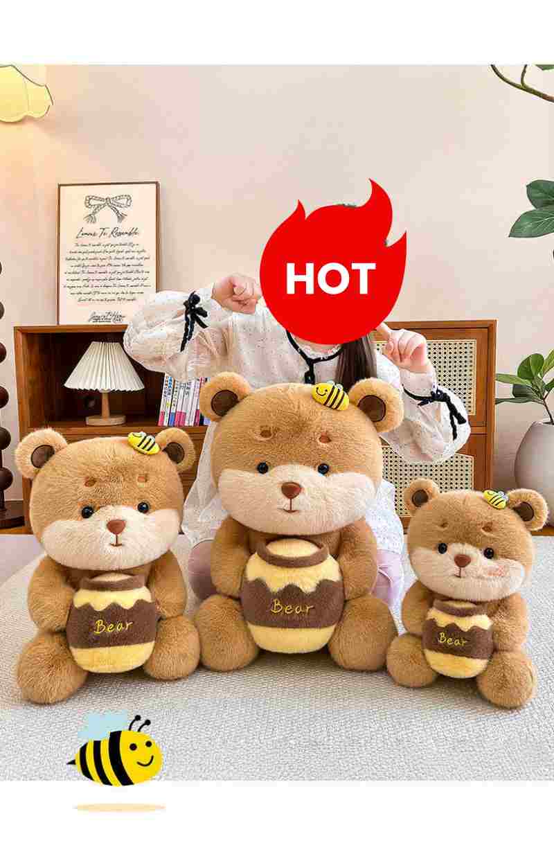 Bulk kawaii bee bear stuffed animals in three sizes, perfect for gift shop retail displays.