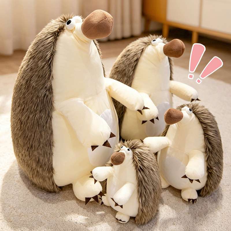 High-ROI hedgehog plush collection arranged in a row from largest to smallest, maximizing impulse-buy gift shop retail appeal.