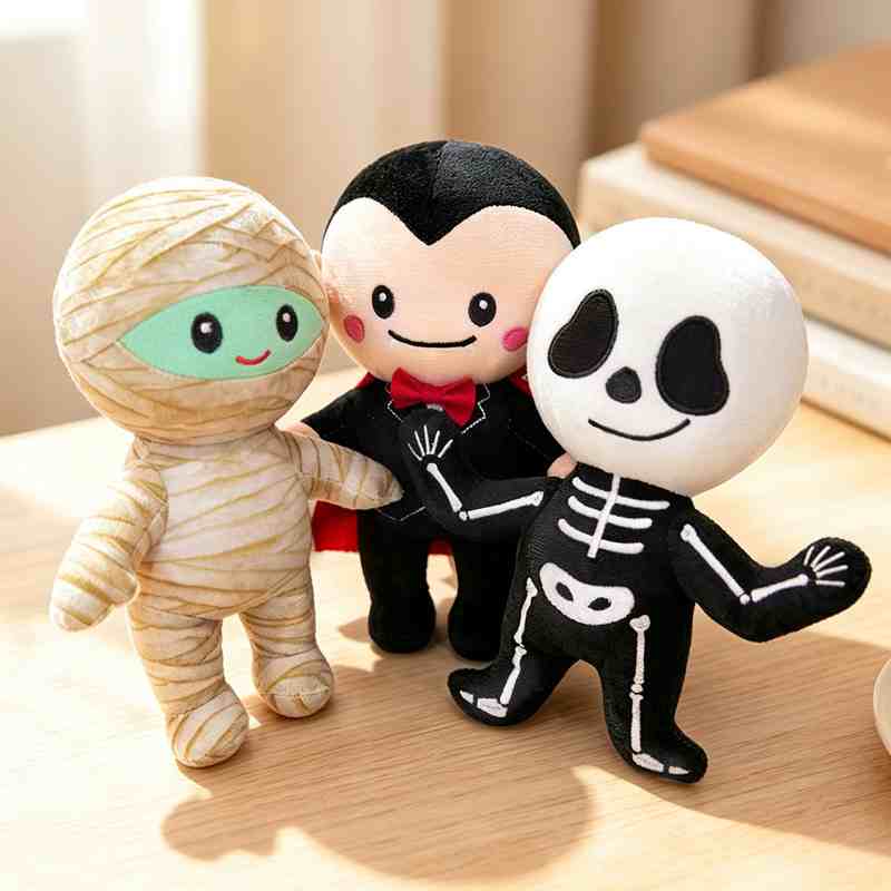 Bulk kawaii vampire, mummy, and skeleton stuffed toys, highlighting custom embroidery detailing for global B2B retailers.