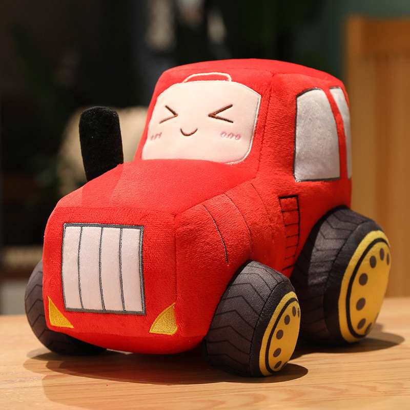 Red tractor soft toy with large wheels designed for bulk B2B sourcing.