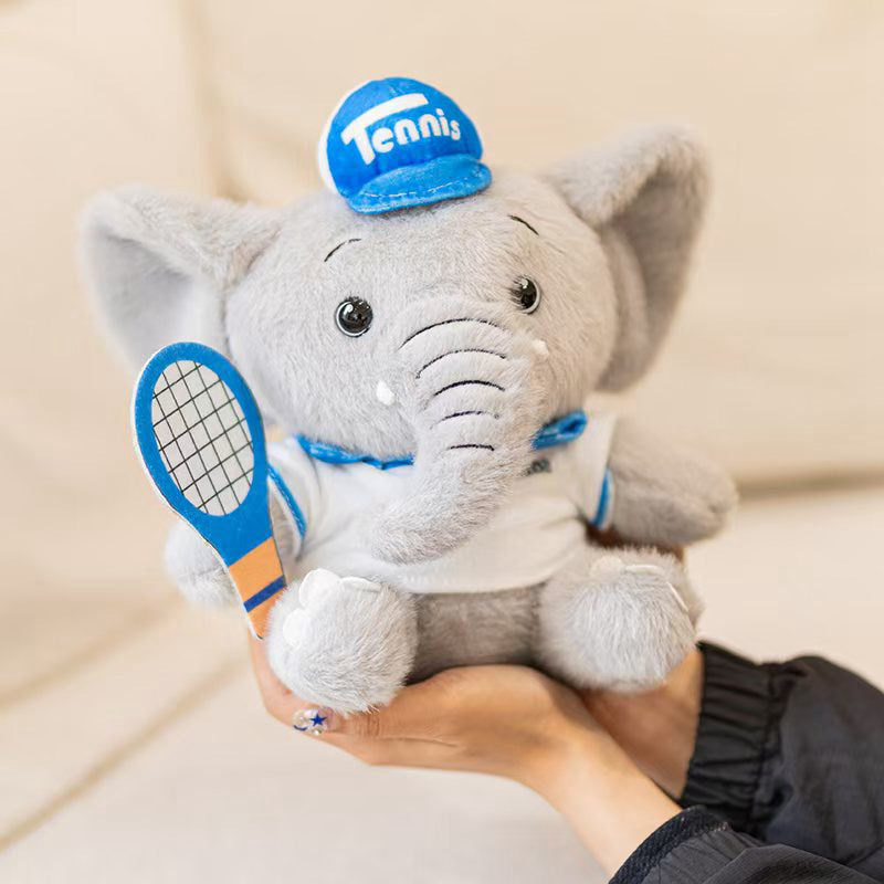 Bulk sports themed elephant stuffed animal held in hands, a high-turnover item for premium toy stores.