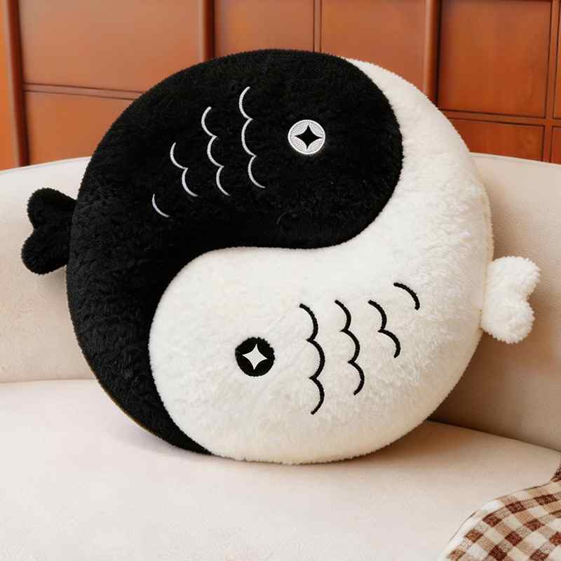 Classic black and white Yin Yang Koi fish plush cushion in textured sherpa fleece.