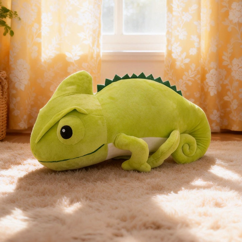 Custom OEM green chameleon plush toy sitting on a rug from a reliable B2B vendor.