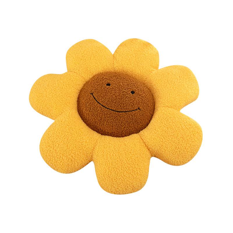 Custom smiley flower plushie cushion on white background for private label OEM manufacturing.