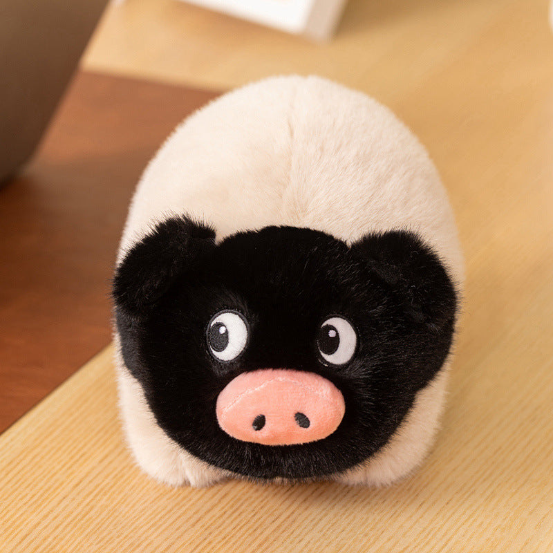A high-quality black-faced pig plush toy with a soft cream body, available as a large stuffed animal and a small keychain bag charm.