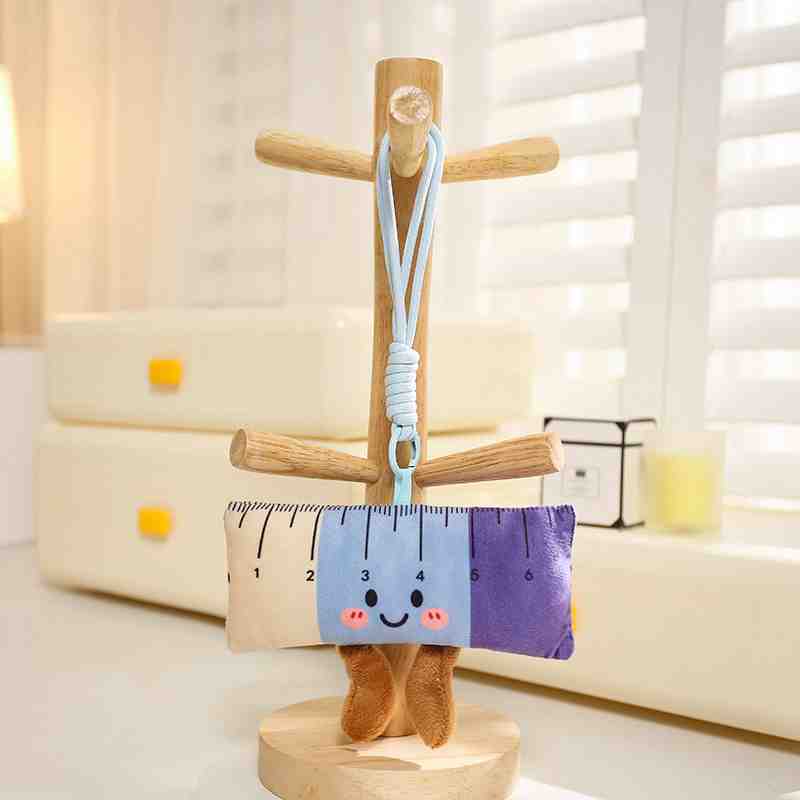 Purple and blue pencil-shaped ruler plush keychain toy, a quirky and soft bag pendant for students.