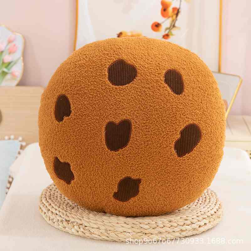 Factory-direct baking theme chocolate chip cookie plush cushion displayed on a mat for B2B trade.