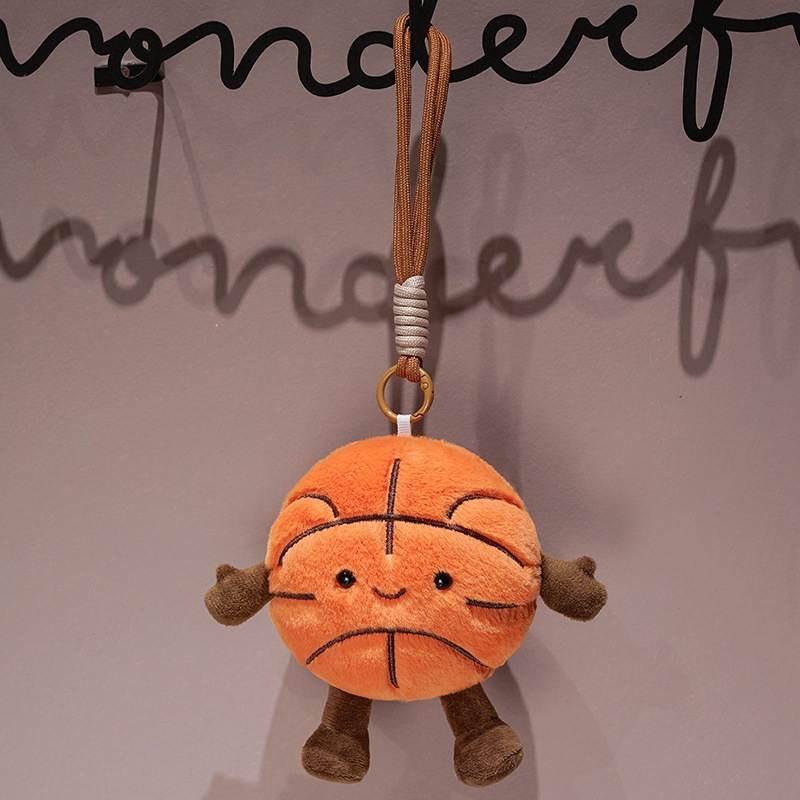 Factory-direct basketball plush keychain with cute arms and legs, ideal for global B2B sourcing.