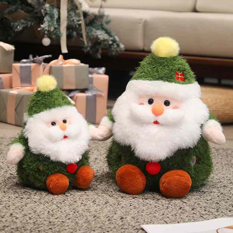 Factory-direct green Santa soft toys in two sizes with holiday gift boxes in the background for sourcing.