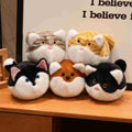 Factory-direct kawaii chubby pet stuffed toy variants stacked together in a group display, excellent for high-visibility retail vendors.
