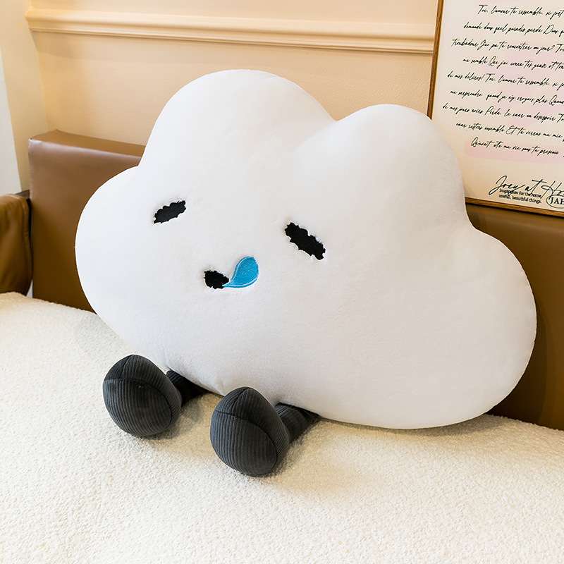 Factory-direct kawaii smiling white cloud plush cushion on bed for B2B sourcing.