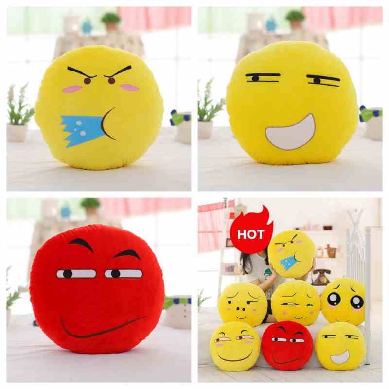 Factory-direct smiley face stuffed toys featuring a red sly emoji, a high-margin item for arcade prizes and corporate gifts.