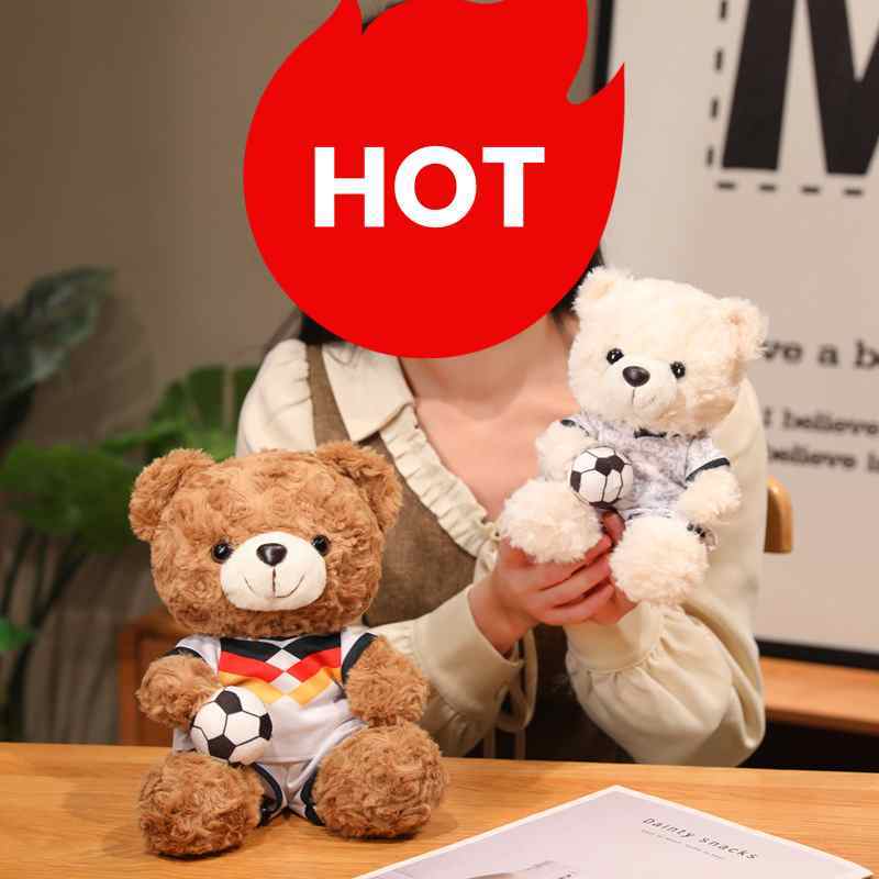 Factory-direct sports themed teddy bear plush showing high quality jersey stitching for gift shop wholesale.