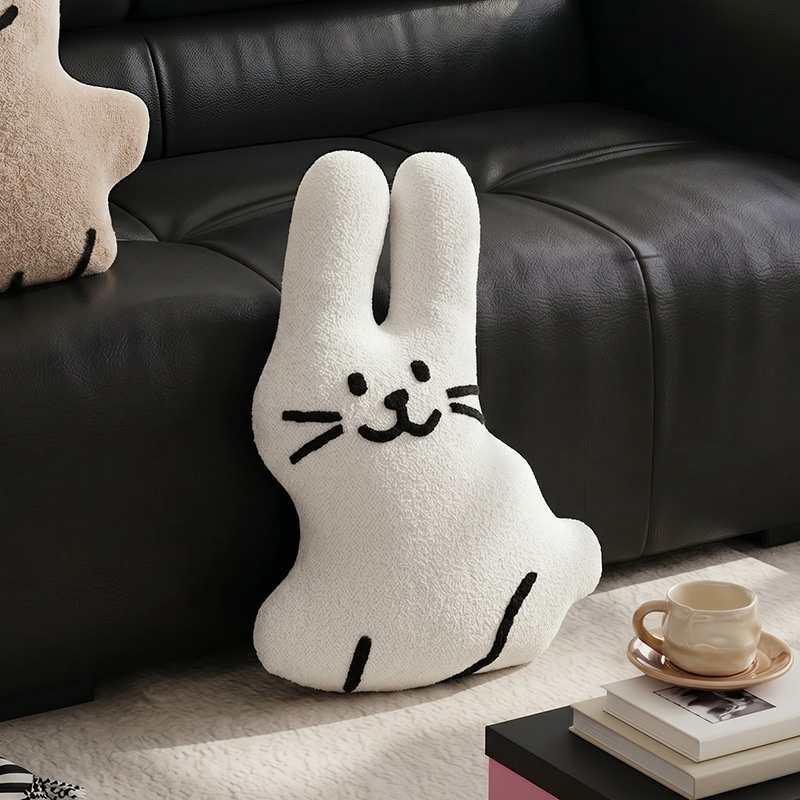 Factory direct minimalist white rabbit boucle floor cushion on a rug for wholesale suppliers.