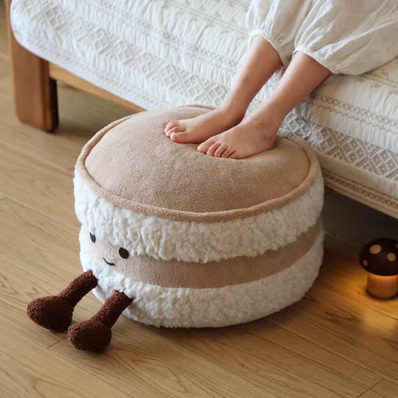 High-ROI biscuit plush footstool used as a comfy footrest, optimized for retail distributors.