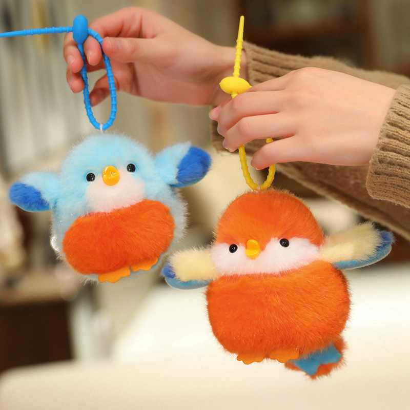 High-ROI fluffy animal keyrings held by loops, an ideal high-ticket jackpot prize for mini claw machines.