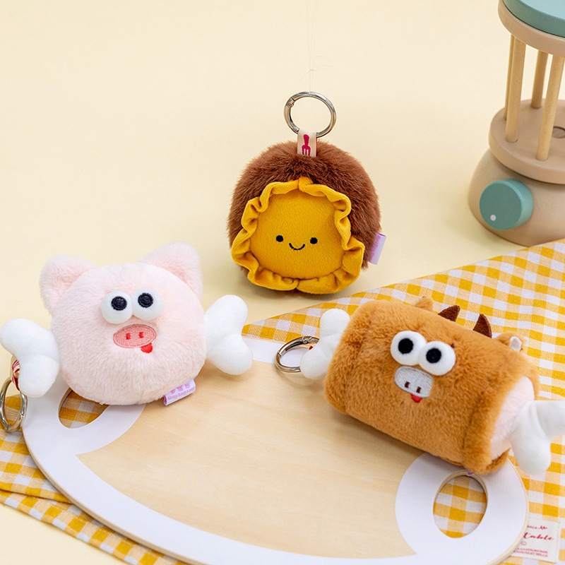 High-ROI flying pig, meat bone, and flower plush keyrings optimized for retail accessory distributors.