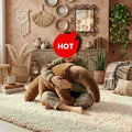 High-ROI giant anteater stuffed animal hugged by a child, a premium aesthetic choice for boutique nursery decor.