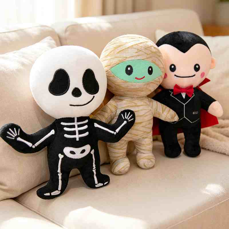 High-ROI Halloween character soft toys standing side by side on a sofa, perfect for custom-branded holiday retail distributors.