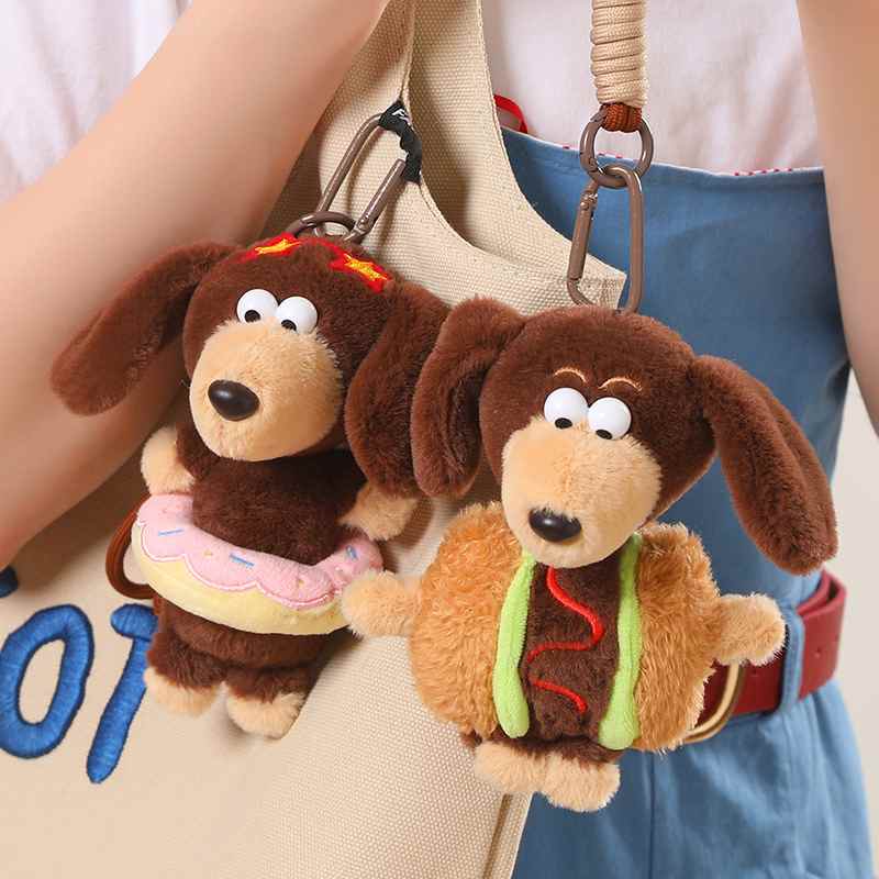 High-ROI kawaii dachshund plush pendants styled on tote bag, optimized for retail gift shop distributors.