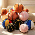 High-ROI plush basketball cushions piled elegantly on a modern sofa, showcasing excellent visual merchandising for retail and wholesale.