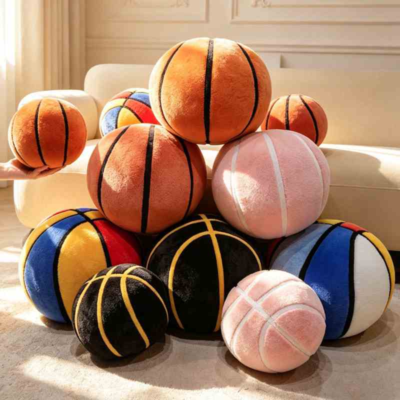 High-ROI plush basketball cushions piled elegantly on a modern sofa, showcasing excellent visual merchandising for retail and wholesale.