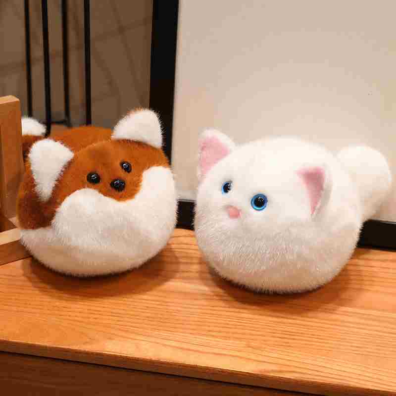 High-ROI round kitty and fox cushion toys sitting side by side on a table, maximizing impulse-buy appeal for gift shop distributors.