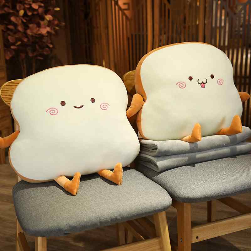 High-ROI sliced bread stuffed toys with cute expressions sitting on chairs, ready for novelty boutique supply.