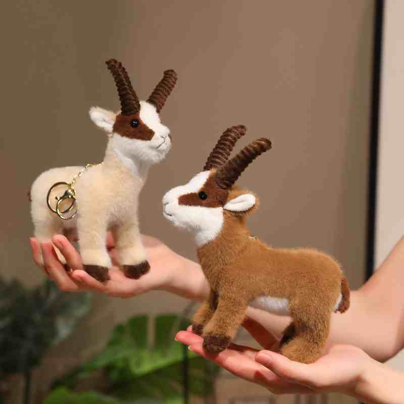 High-ROI wildlife mountain goat plushies in hand, maximizing impulse-buy appeal for nature park gift shop distributors.