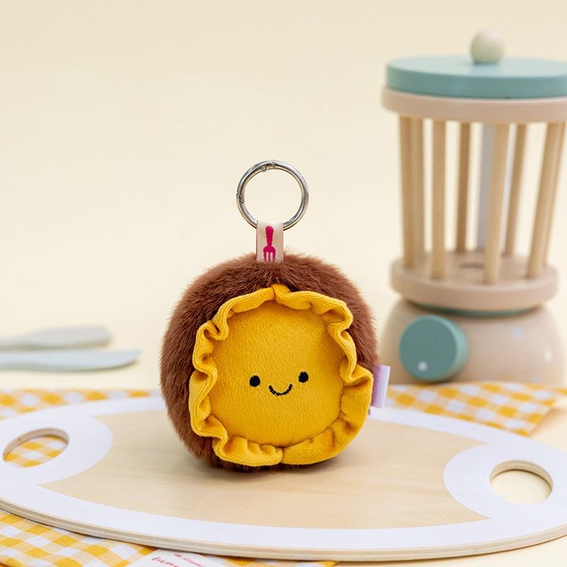 Kawaii yellow flower food plush pendant for global wholesale accessory suppliers.