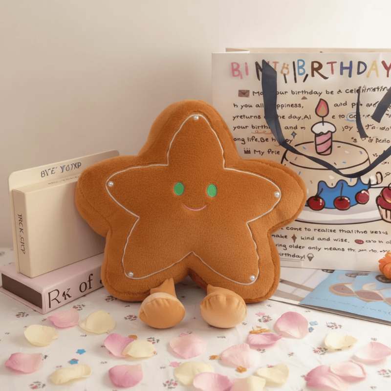 Kawaii gingerbread star plushie cushion on table with gift bag for boutique gift shop supply.