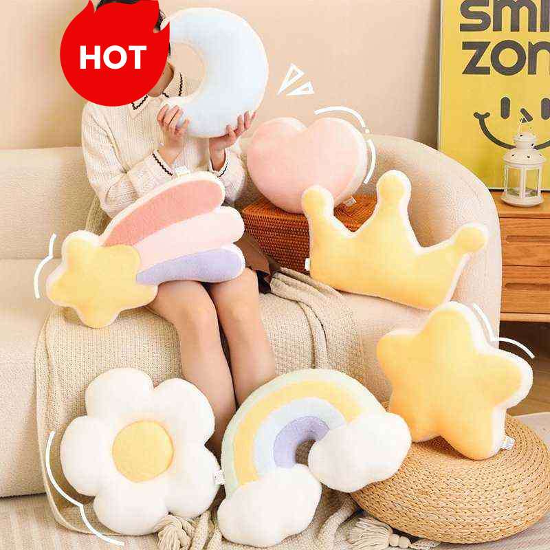 Wholesale kawaii pastel mixed shaped plush pillow collection featuring moon, star, and rainbow cushions for B2B nursery decor sourcing.