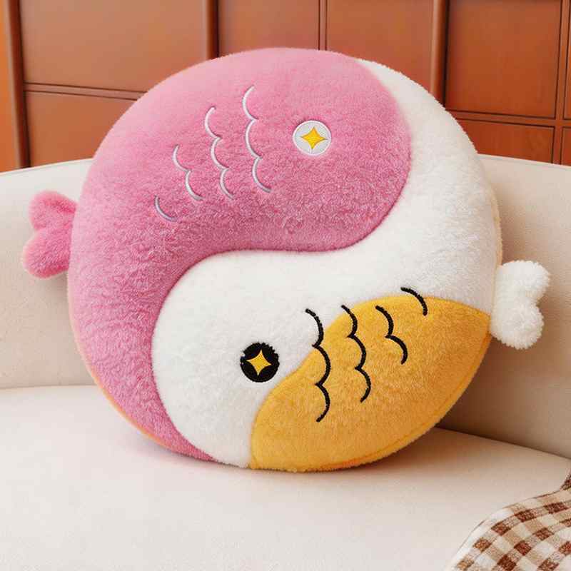 Pastel pink and white Kawaii Yin Yang fish plush cushion for aesthetic room decor.