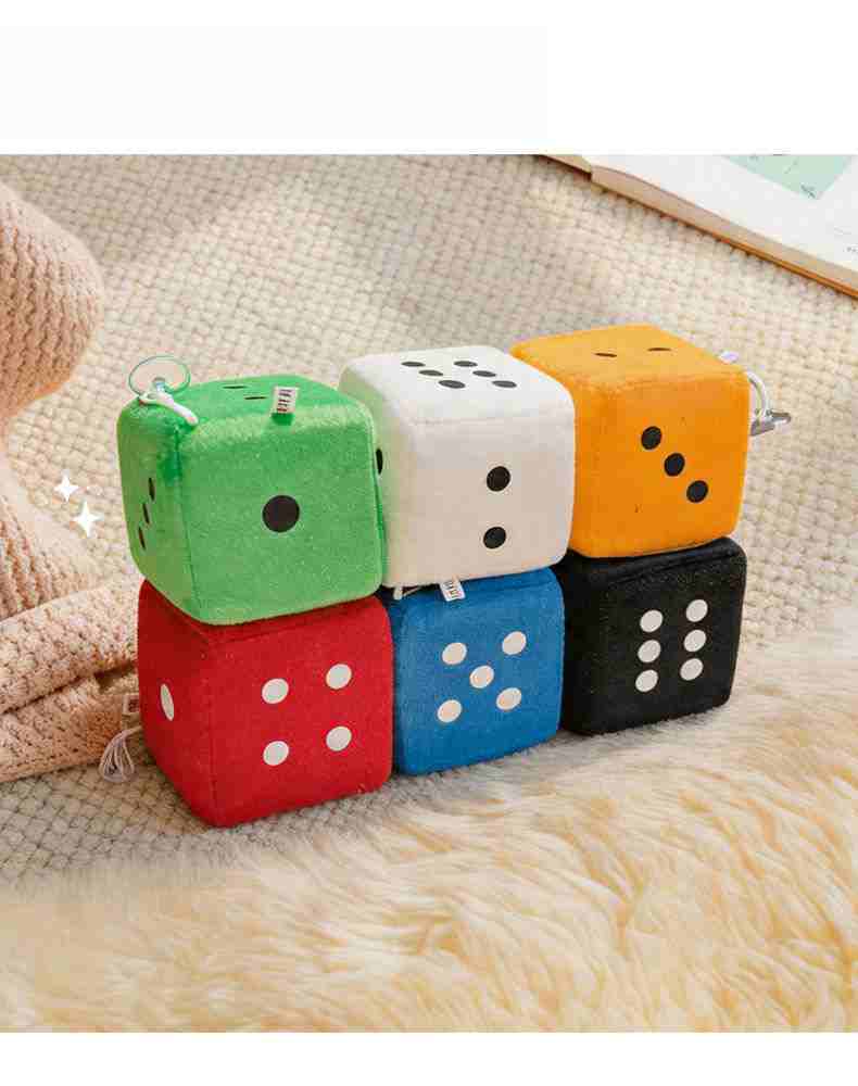 Soft and squishy plush dice detail, an ideal claw-friendly prize for arcade operators.