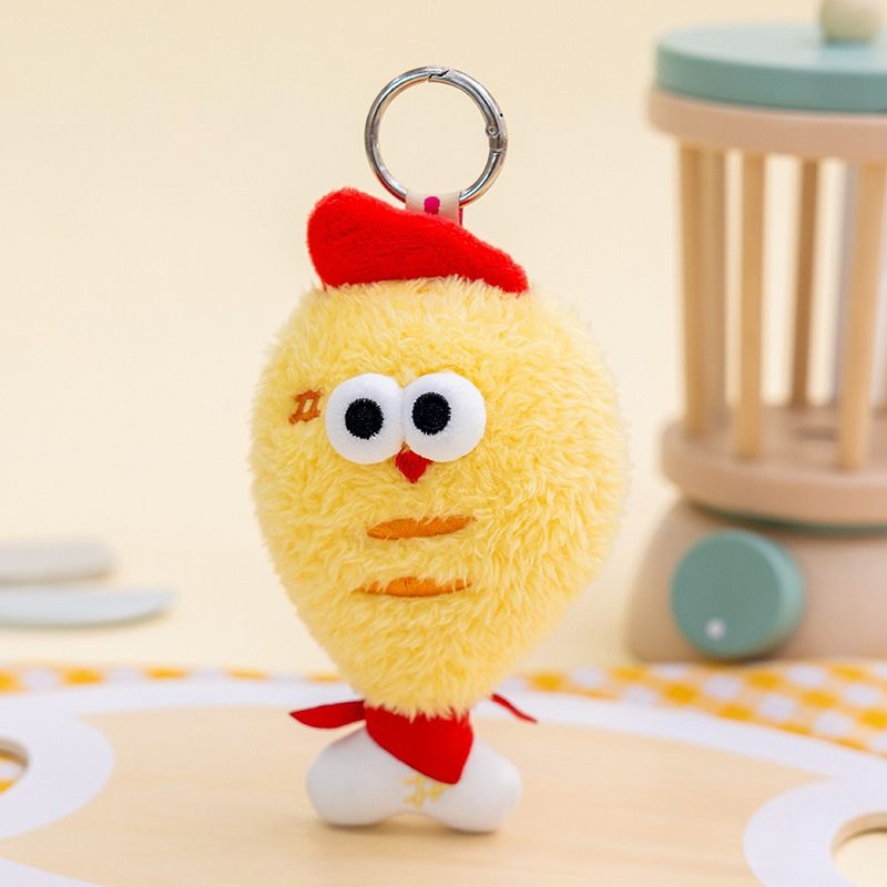 Novelty fried chicken bag charm with red hat for trendy gift shop supply.
