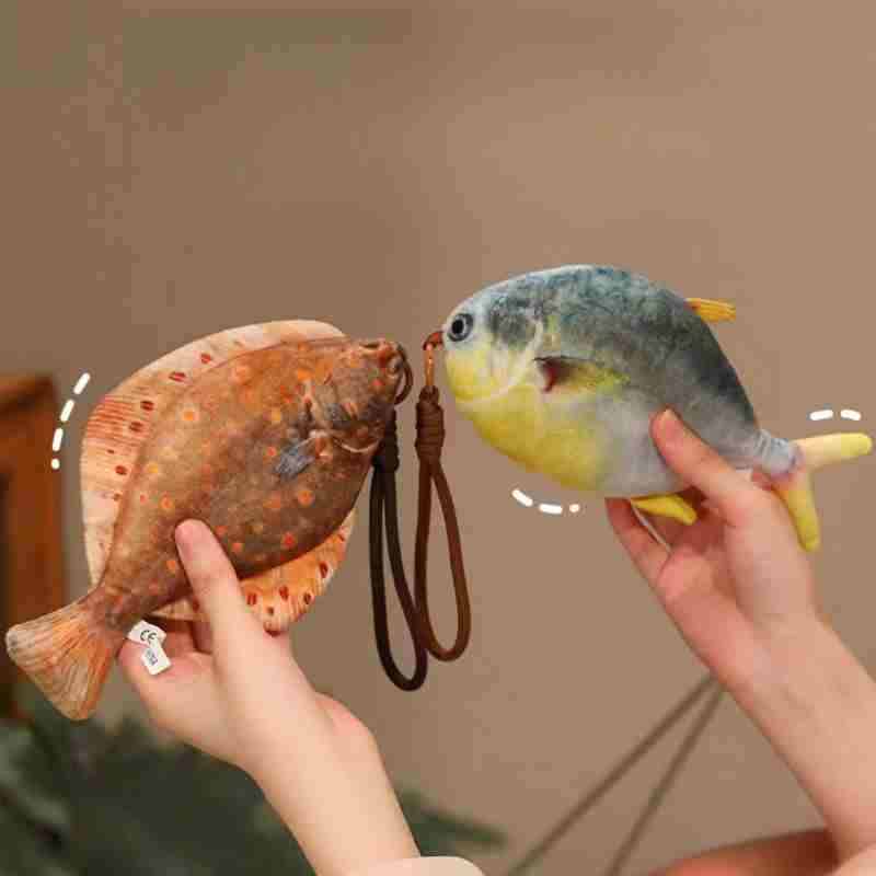 Premium 3D printed fish stuffed toy being held, a high-margin novelty gag gift for retail distribution.