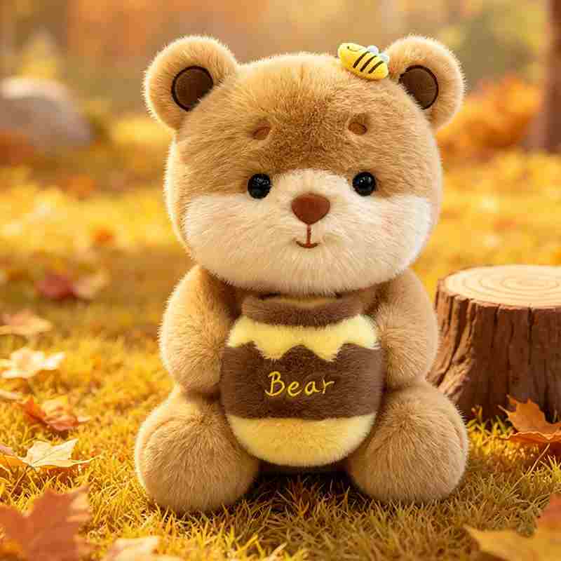 Premium autumn honey bear cushion sitting on leaves, designed for global toy distributors.